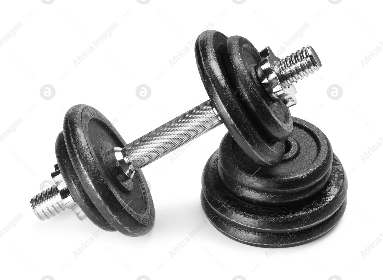 Photo of Barbell and stack of weight plates isolated on white