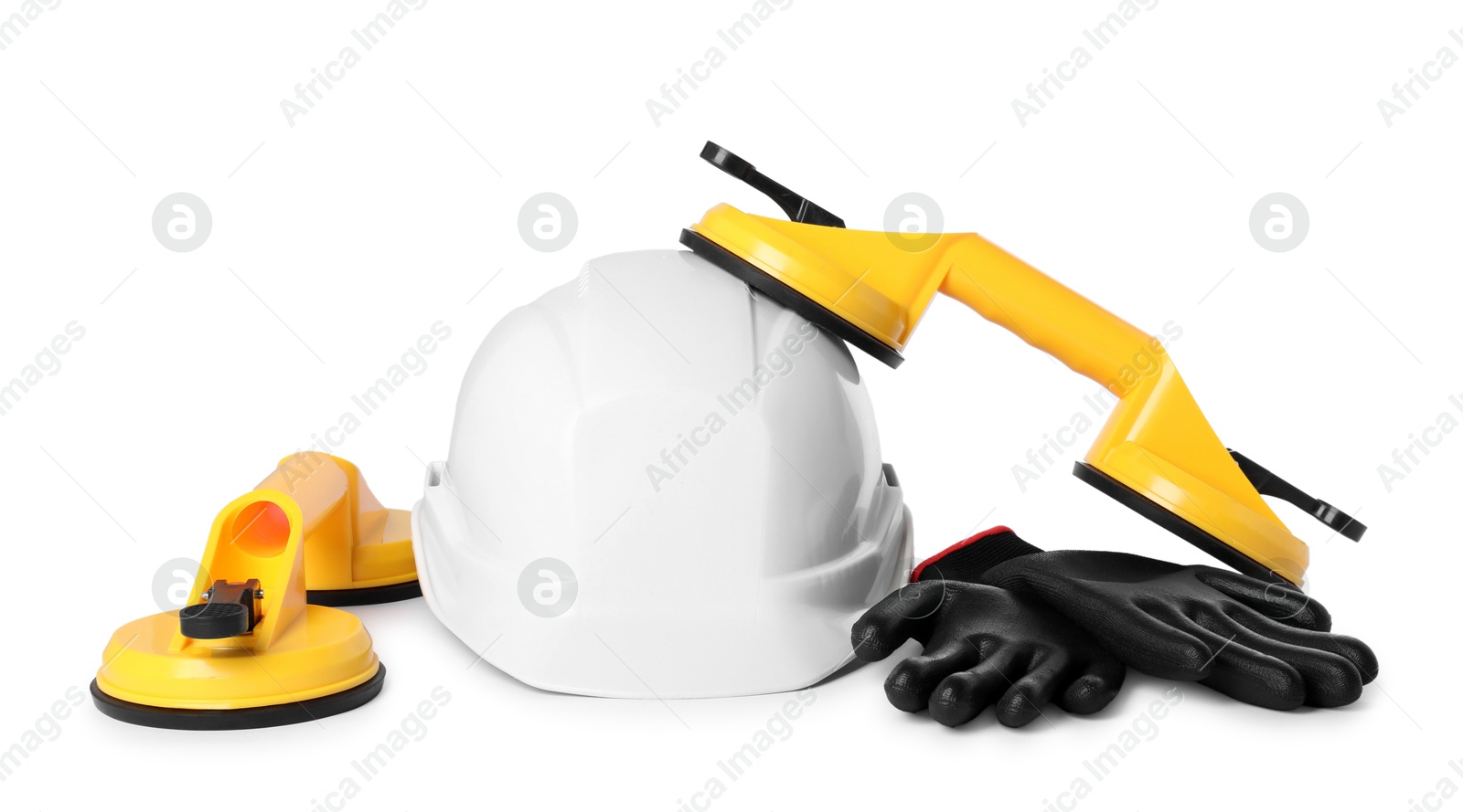 Photo of Hard hat, protective gloves and glass suction cups isolated on white