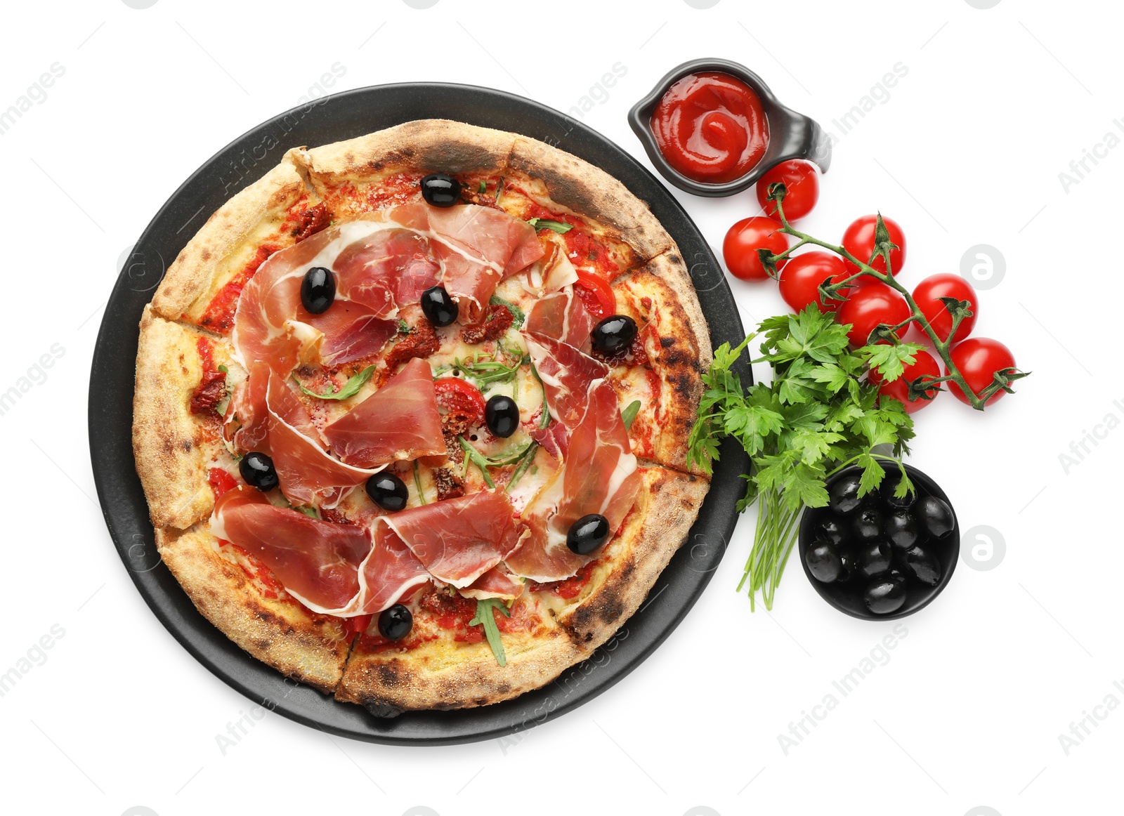 Photo of Tasty pizza with cured ham, olives, tomatoes, parsley and sauce isolated on white, top view