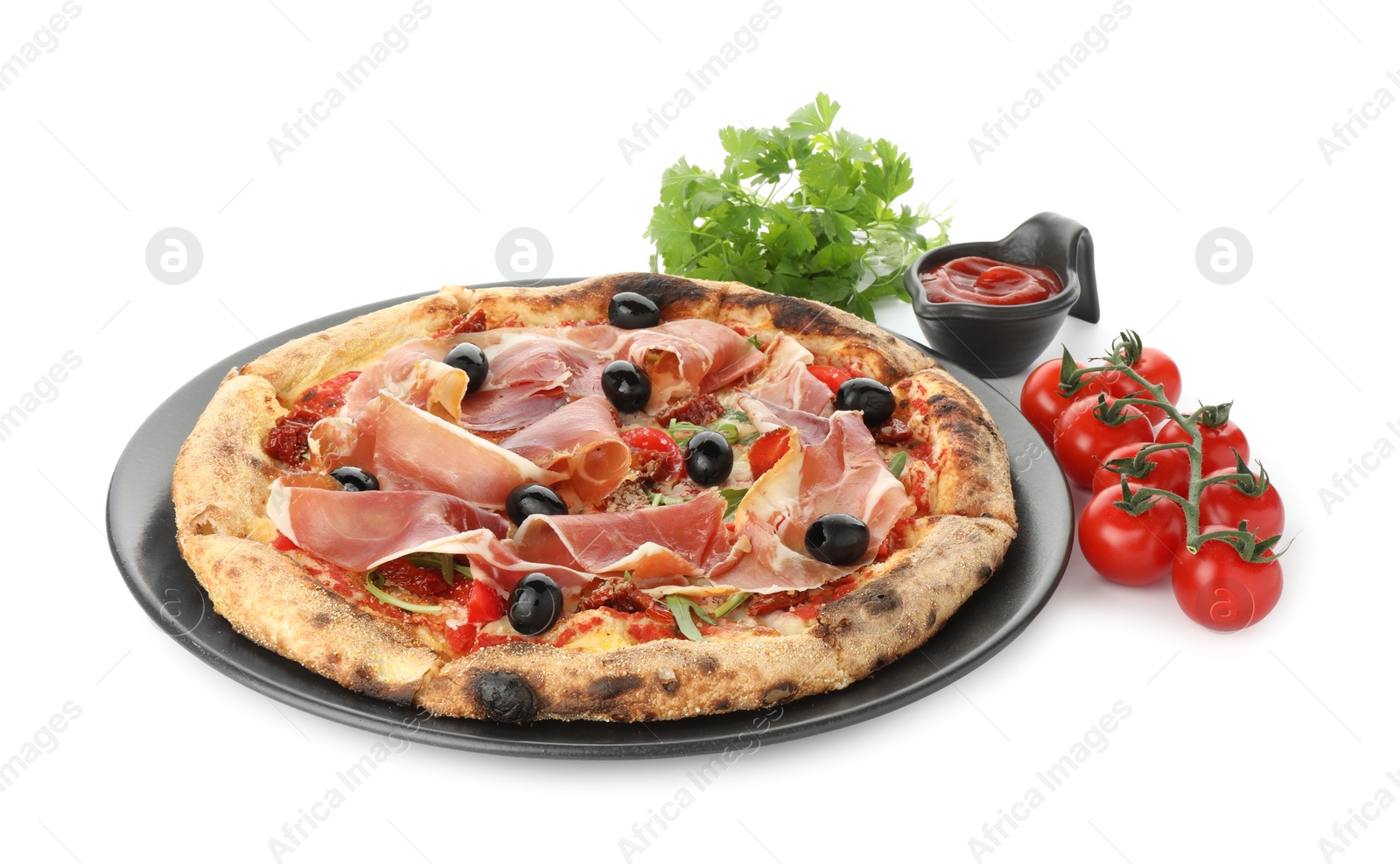 Photo of Tasty pizza with cured ham, olives, tomatoes, parsley and sauce isolated on white