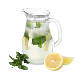 Photo of Refreshing lemonade with mint in jug and ingredients isolated on white