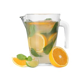 Freshly made lemonade with oranges, lime and mint isolated on white