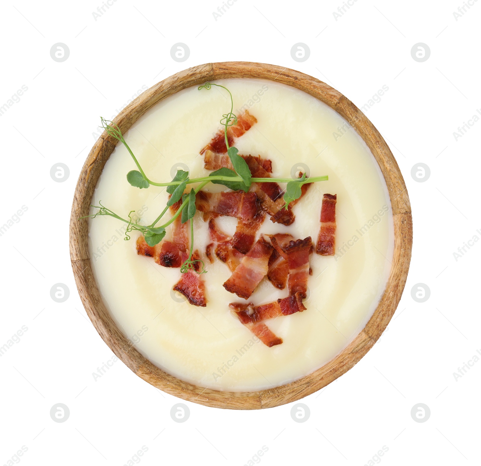 Photo of Delicious potato soup with bacon and microgreens in bowl isolated on white, top view