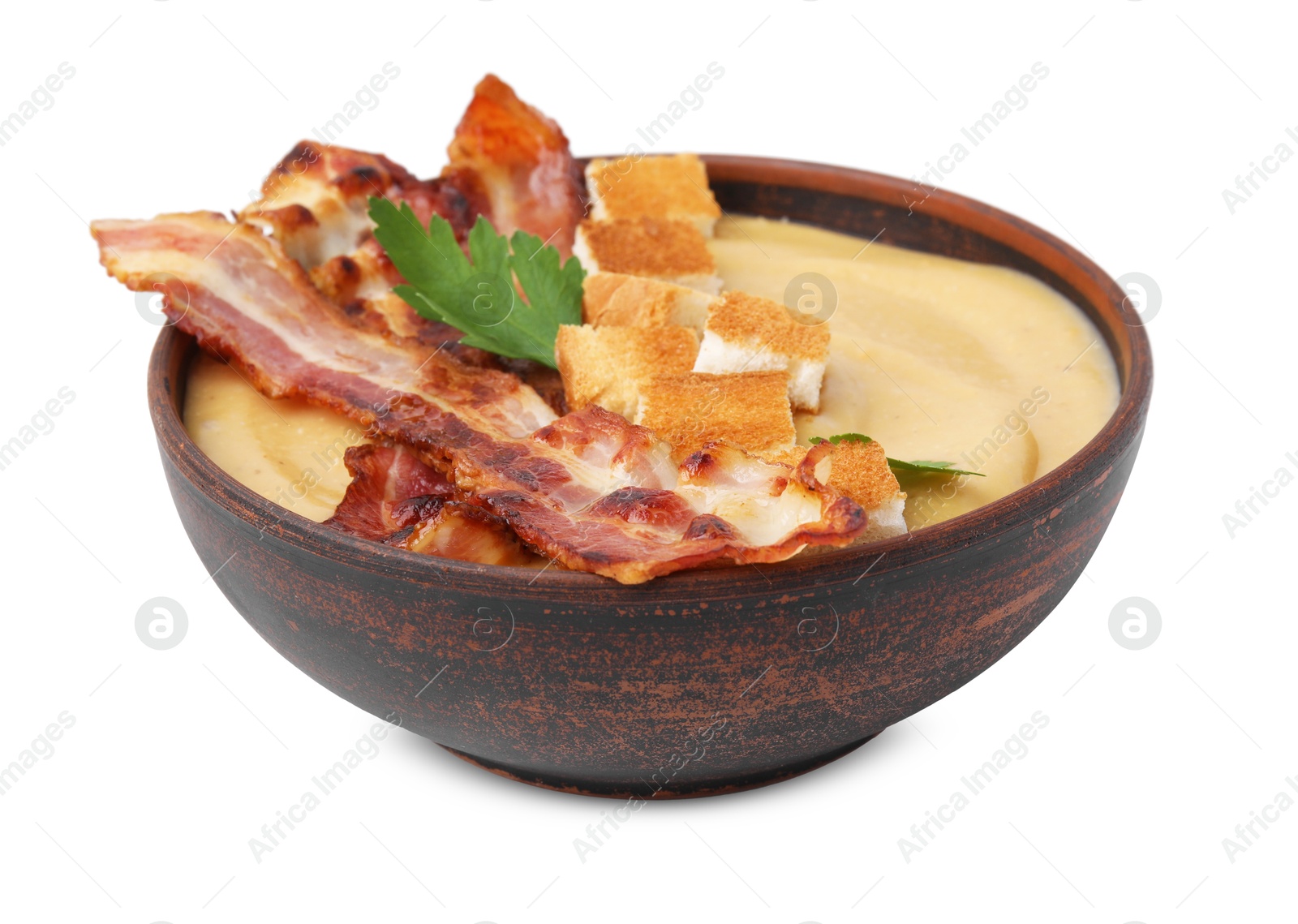 Photo of Delicious lentil soup with bacon and parsley in bowl isolated on white