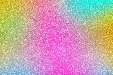 Bright colorful sparkling glitter, closeup. Background for party invitations or holiday cards