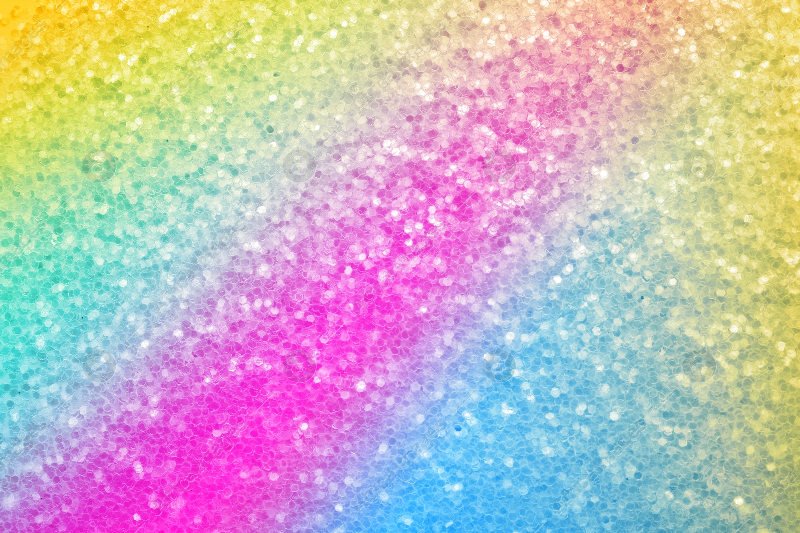 Image of Bright colorful sparkling glitter, closeup. Background for party invitations or holiday cards