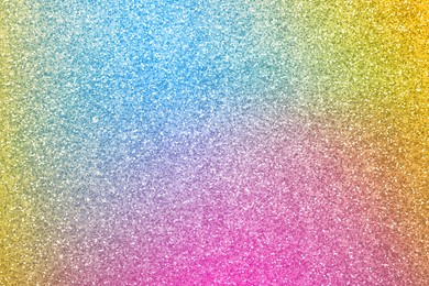 Image of Bright colorful sparkling glitter, closeup. Background for party invitations or holiday cards