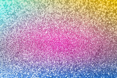 Image of Bright colorful sparkling glitter, closeup. Background for party invitations or holiday cards