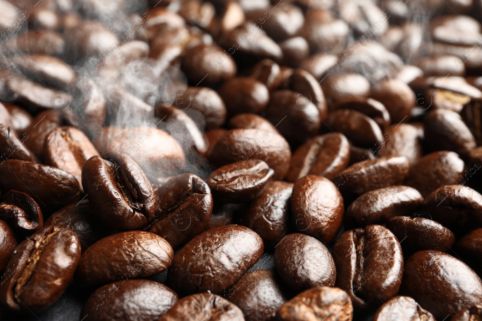 Image of Freshly roasted coffee beans as background, closeup