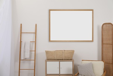 Image of Room for child with blank picture on wall. Interior design