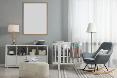 Room for child with blank picture on grey wall. Interior design