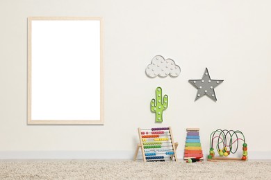 Room for child with blank picture on wall. Interior design