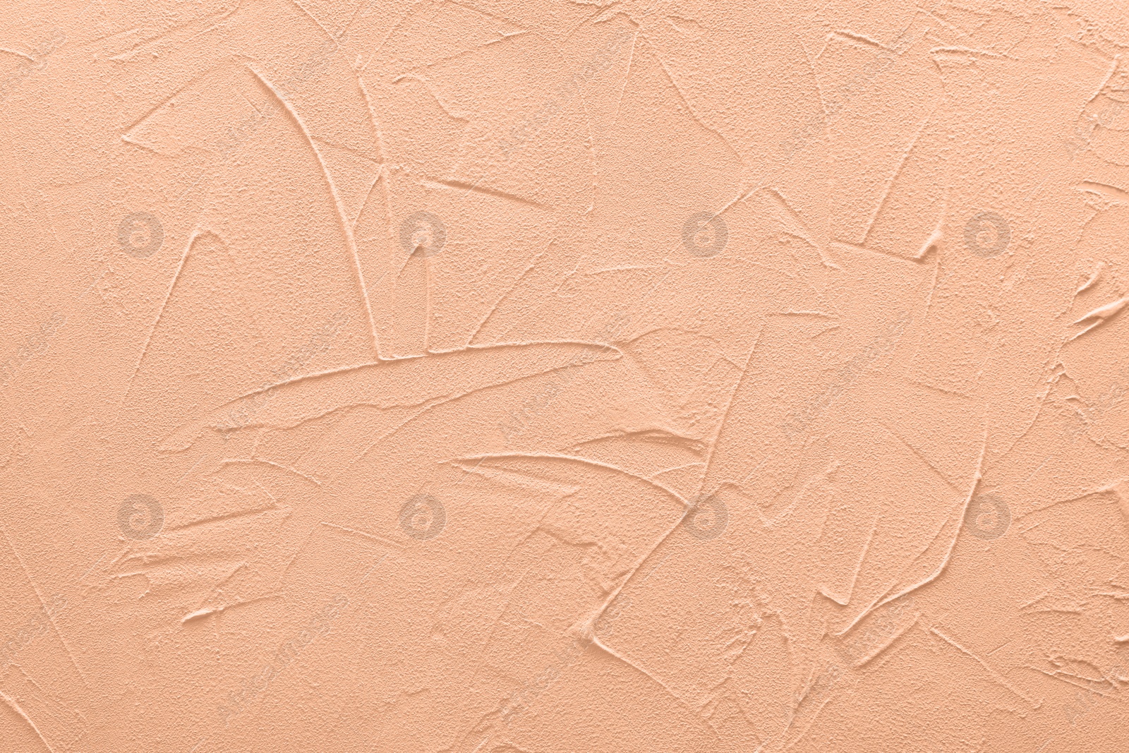 Image of Peach fuzz textured surface, closeup. Trendy shade of 2024 year