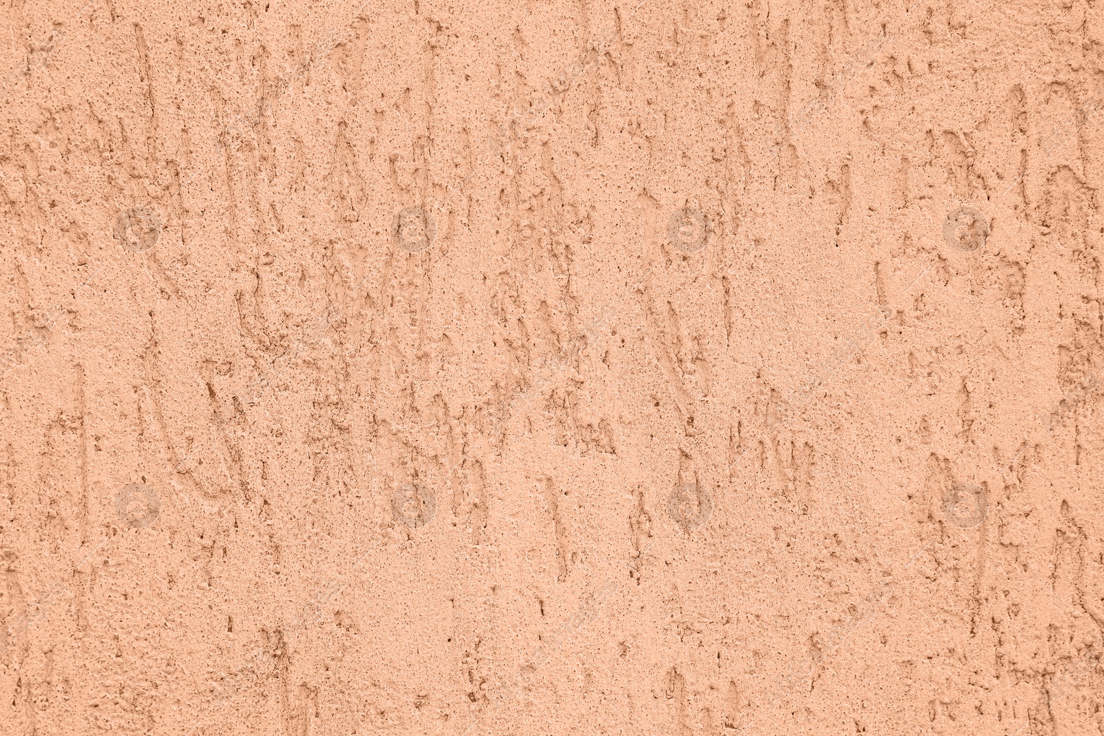 Image of Peach fuzz textured surface, closeup. Trendy shade of 2024 year