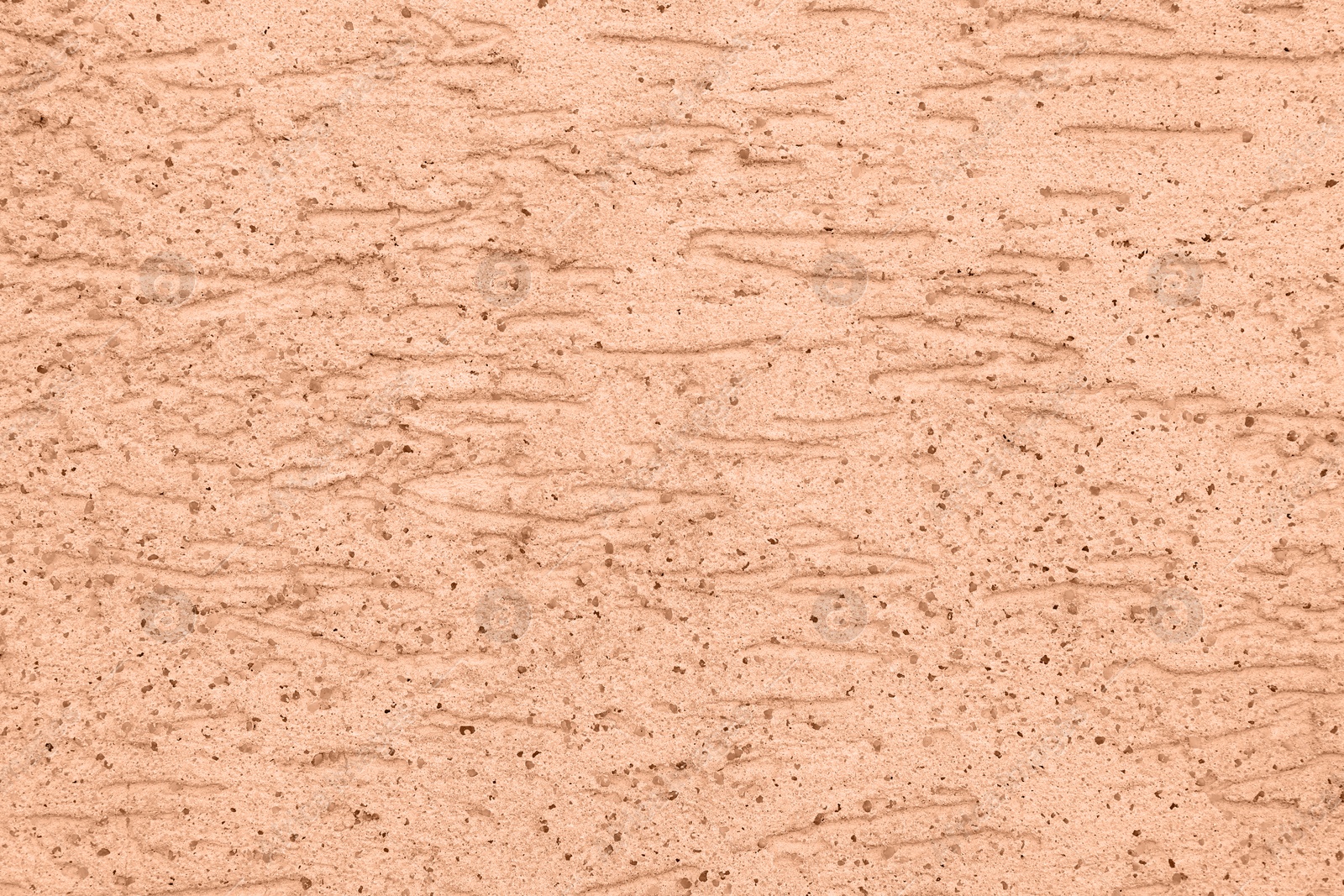 Image of Peach fuzz textured surface, closeup. Trendy shade of 2024 year