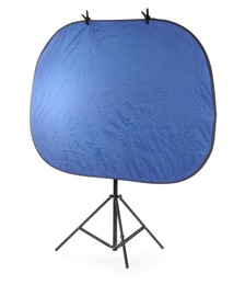 Photo of Stand with reflector isolated on white. Photo studio equipment