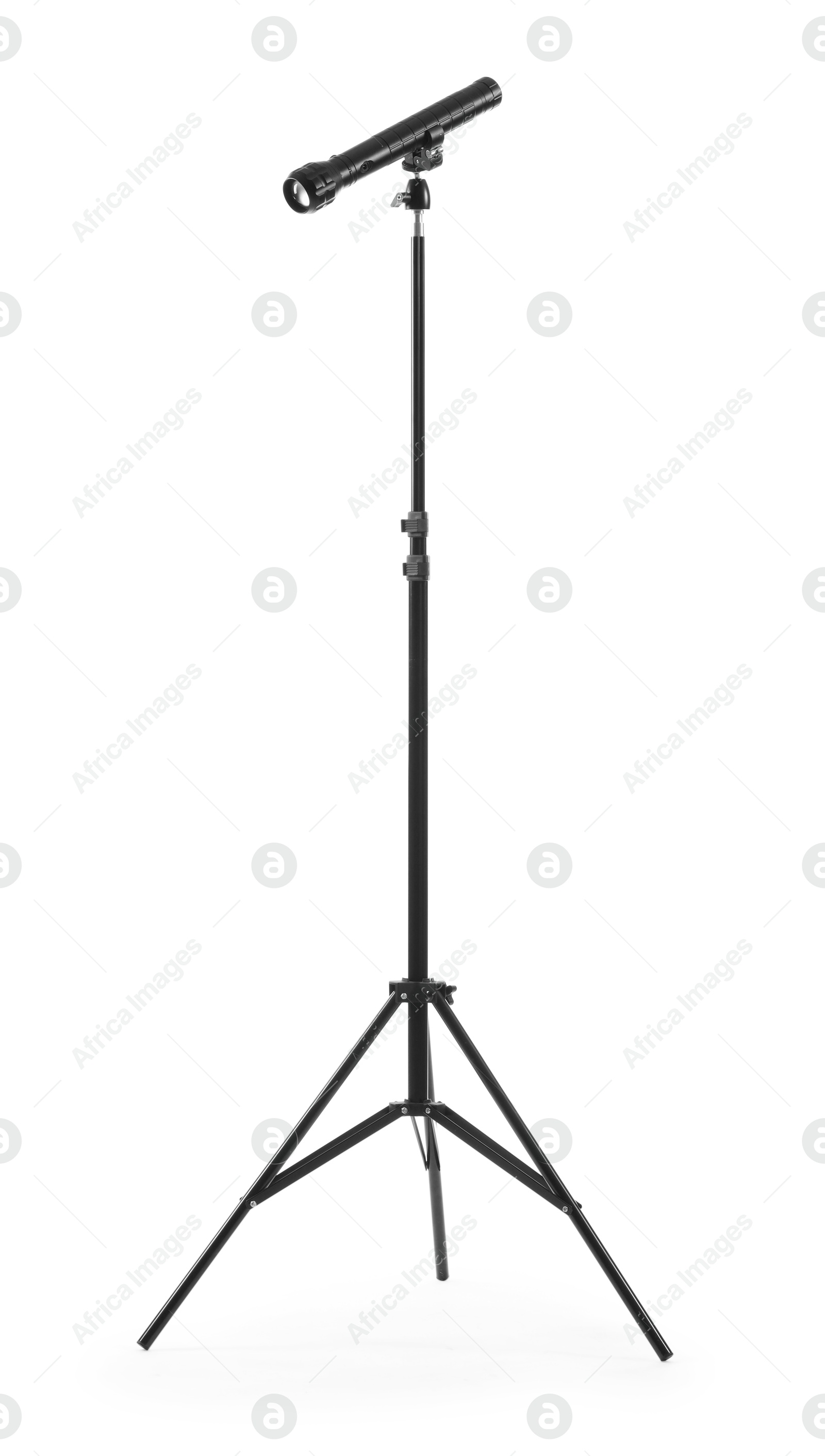 Photo of Tripod with spotlight isolated on white. Photo studio equipment