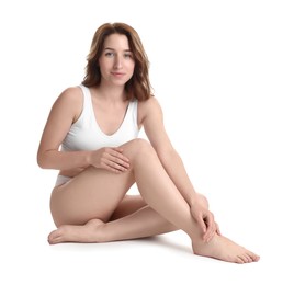 Woman with slim body posing on white background
