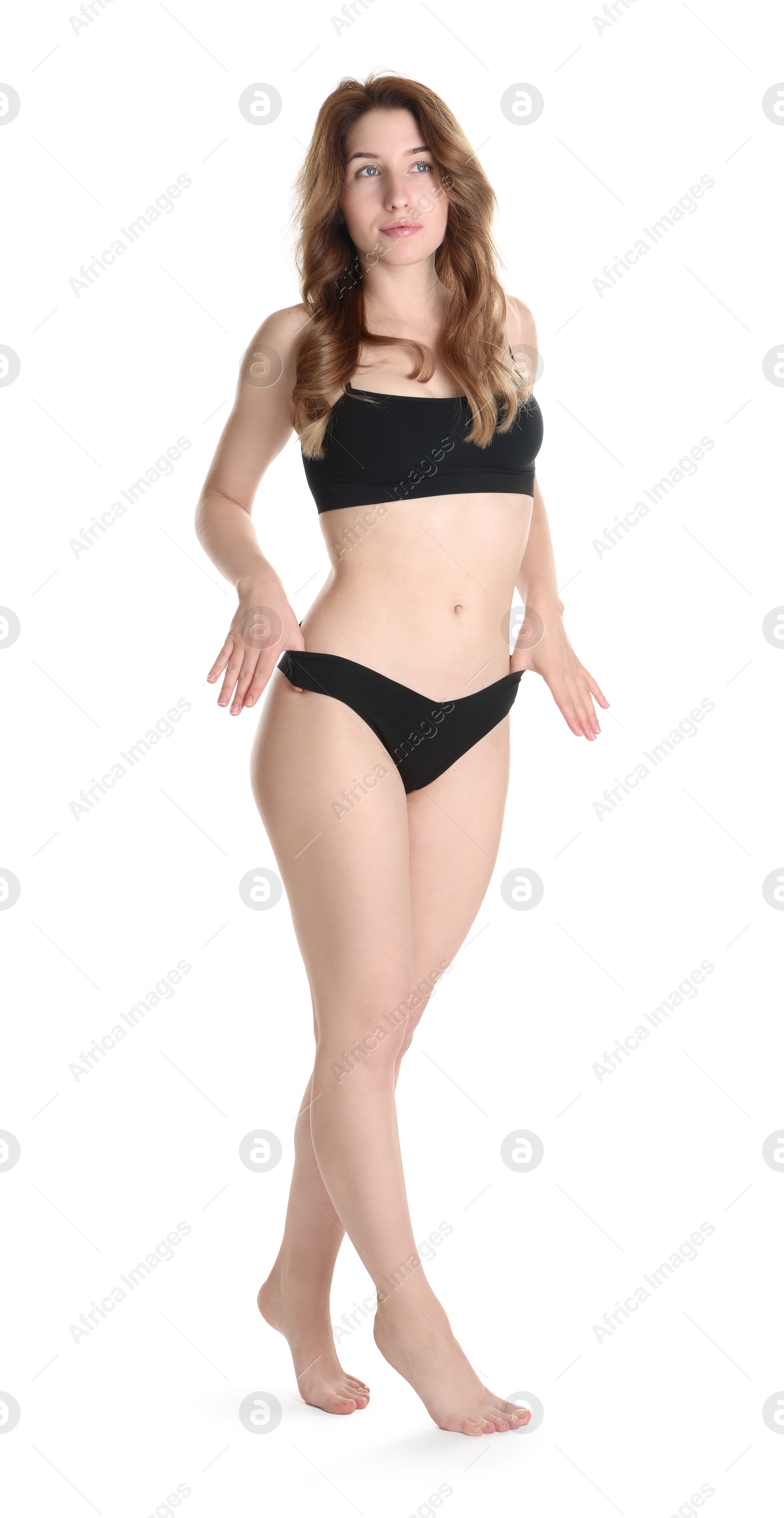 Photo of Woman with slim body posing on white background