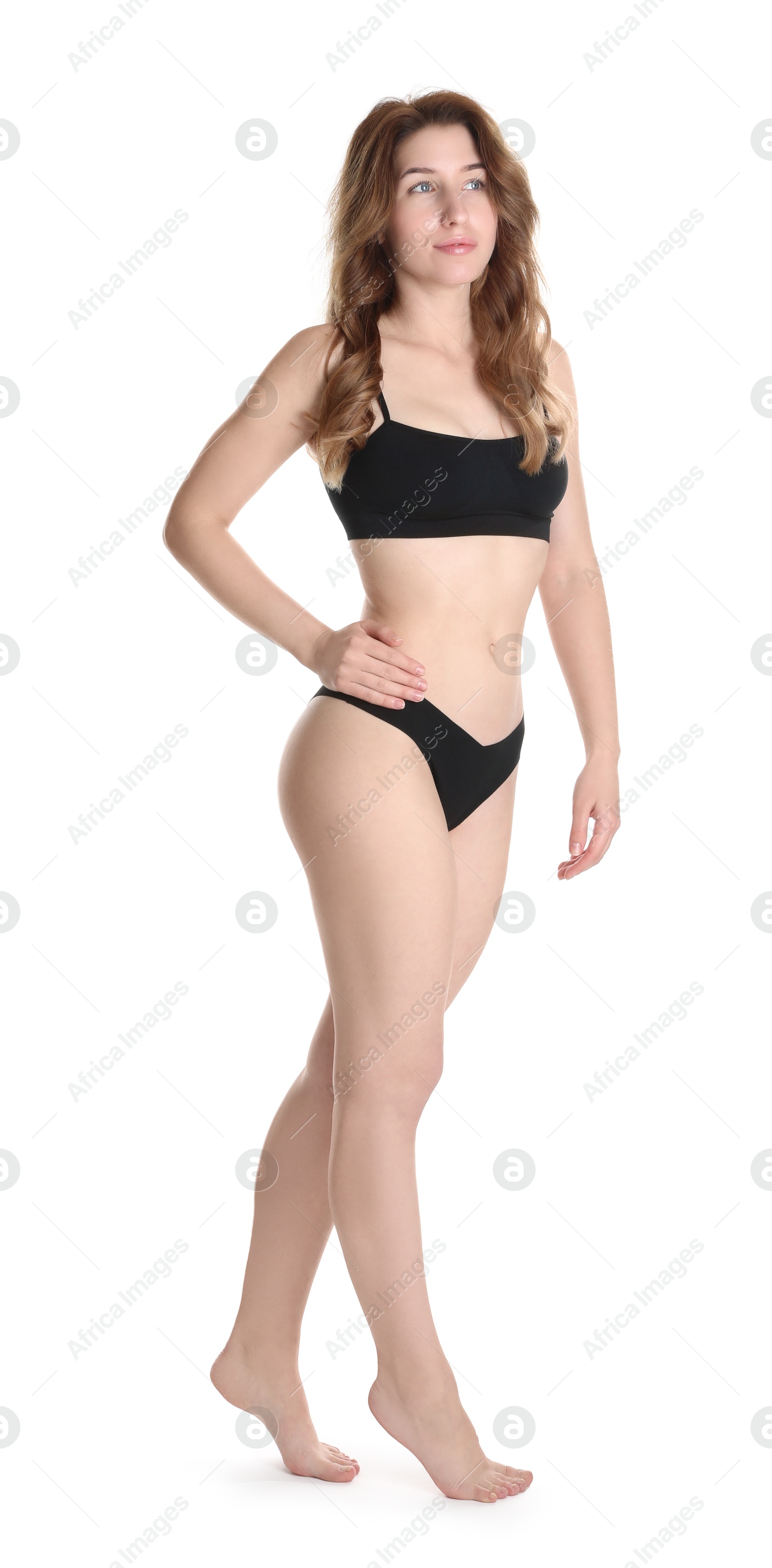 Photo of Woman with slim body posing on white background