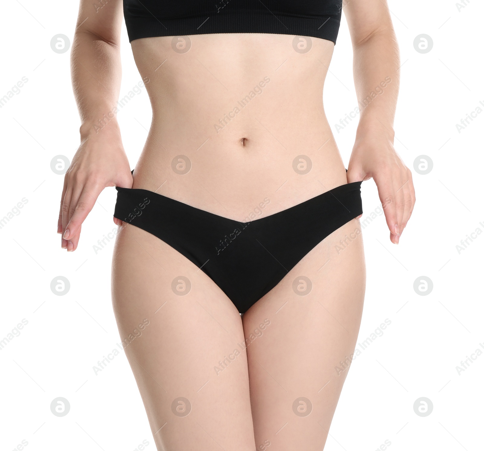 Photo of Woman with slim body posing on white background, closeup