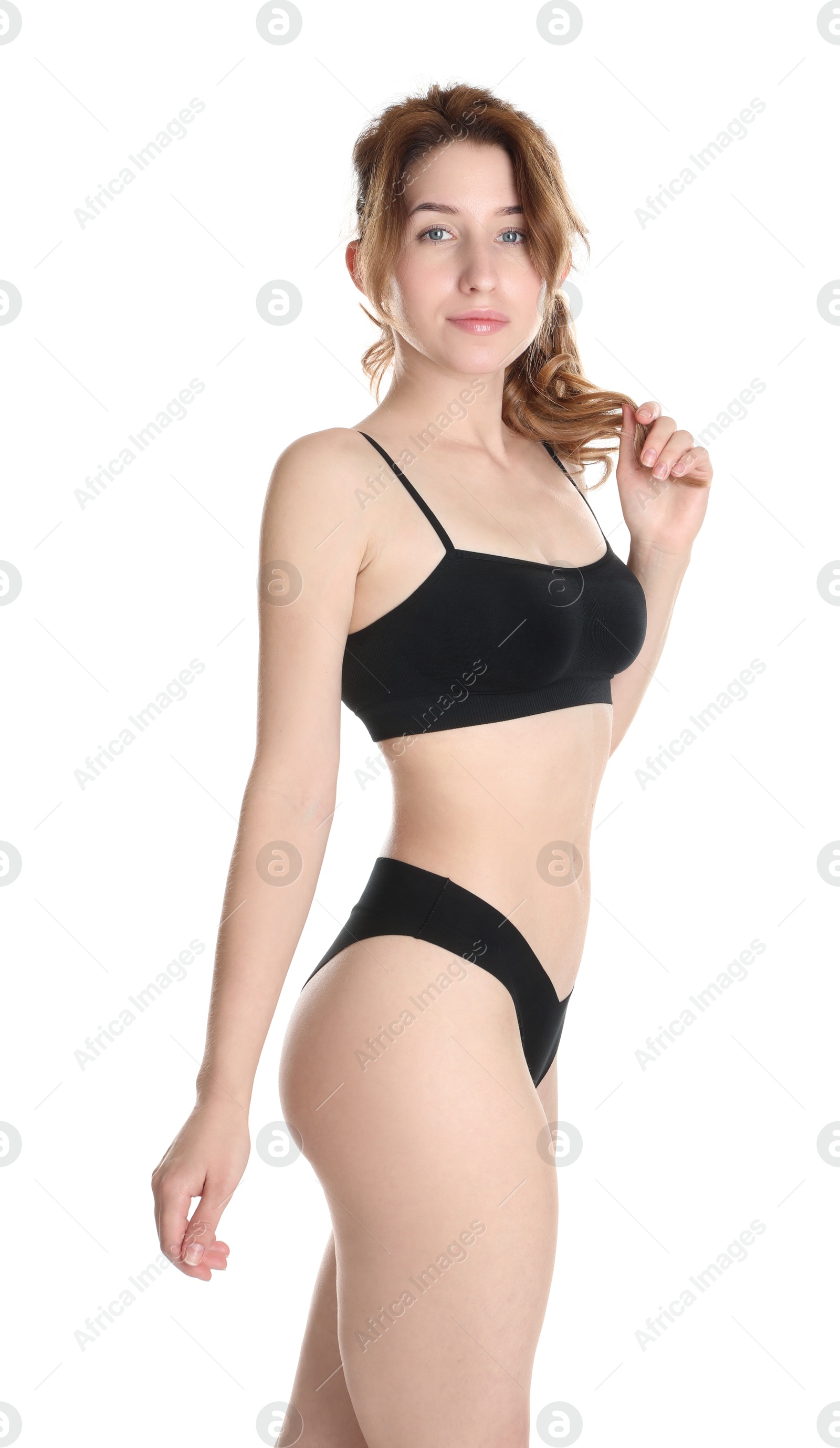 Photo of Woman with slim body posing on white background