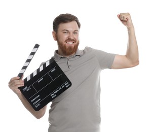 Photo of Making movie. Smiling man with clapperboard on white background