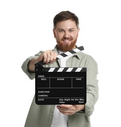 Photo of Making movie. Smiling man with clapperboard on white background