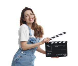 Making movie. Smiling woman with clapperboard on white background