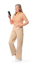 Senior woman with phone on white background