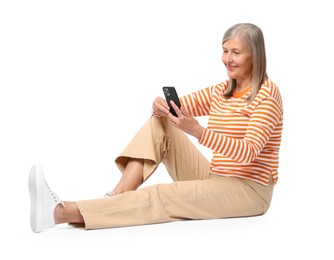 Senior woman with phone on white background