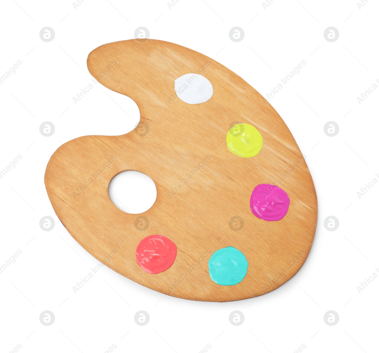 Photo of Wooden artist's palette with samples of paints isolated on white, top view