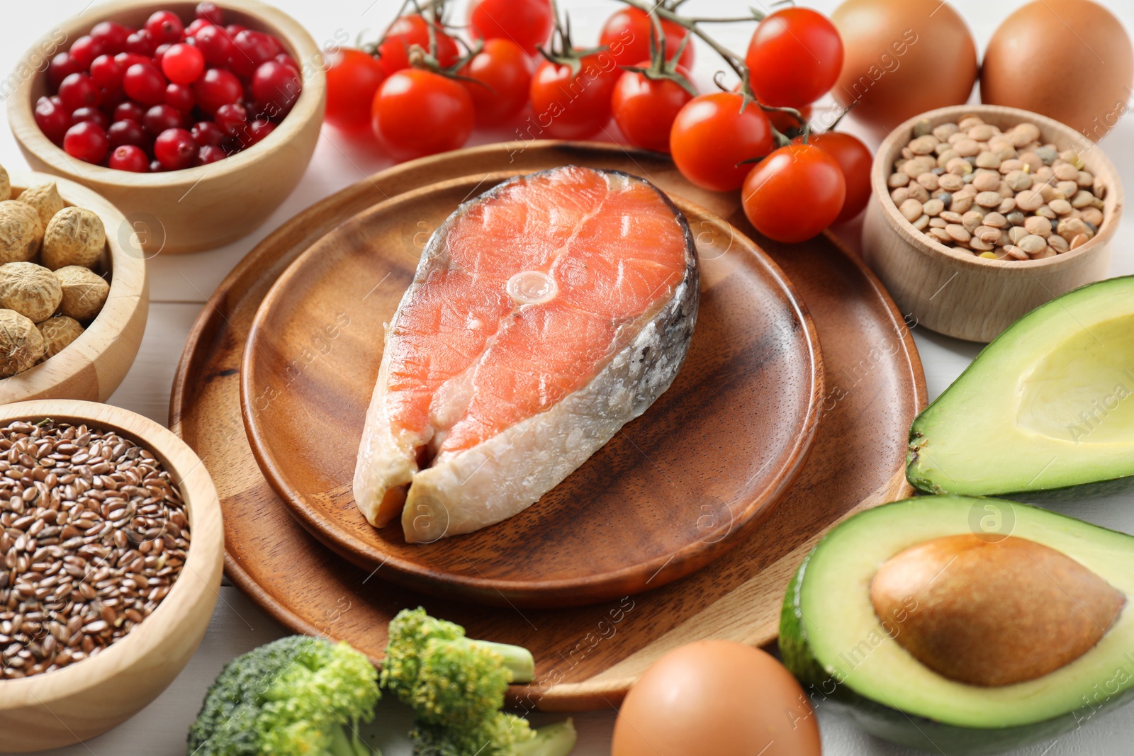 Photo of Many different healthy food on white table, closeup