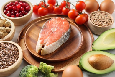 Many different healthy food on white table, closeup