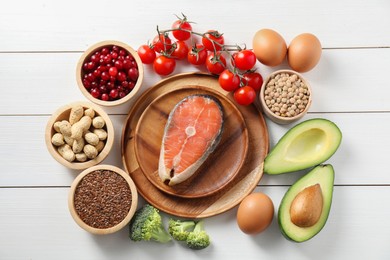 Photo of Many different healthy food on white wooden table, flat lay