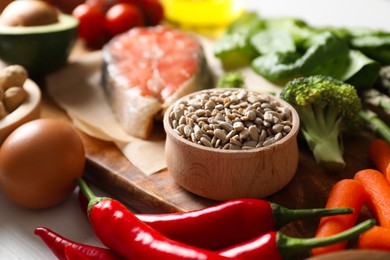 Many different healthy food on white table, closeup