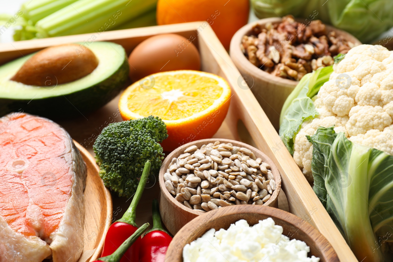 Photo of Cauliflower, salmon, broccoli and other healthy food, closeup