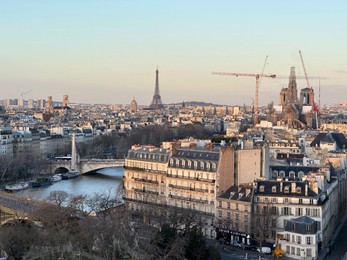 Photo of Beautiful buildings, Eiffel tower and river in Paris, view from hotel window