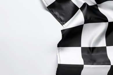 One checkered flag on white background, top view. Space for text