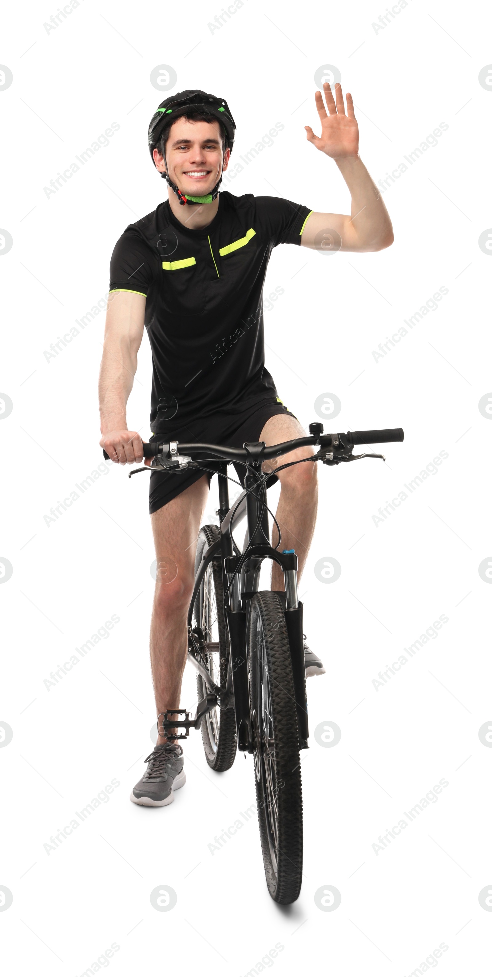 Photo of Smiling man in helmet on bicycle against white background