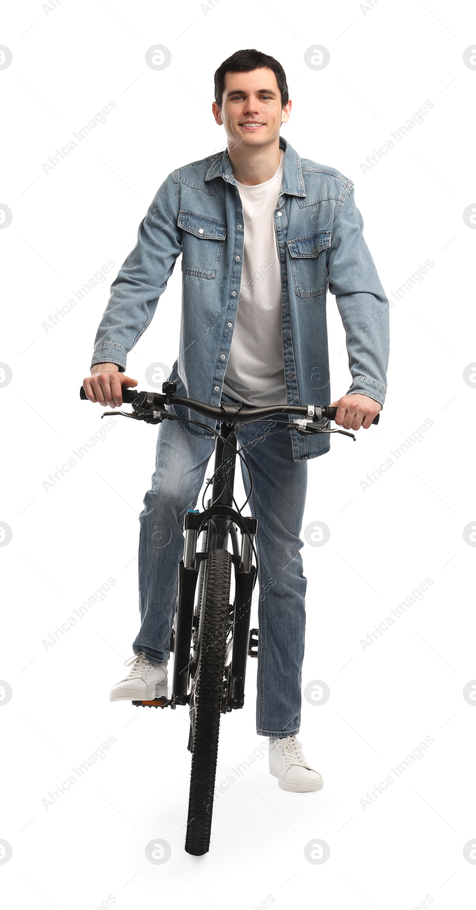 Photo of Smiling man riding bicycle on white background