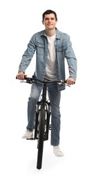 Smiling man riding bicycle on white background