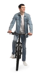 Photo of Smiling man riding bicycle on white background