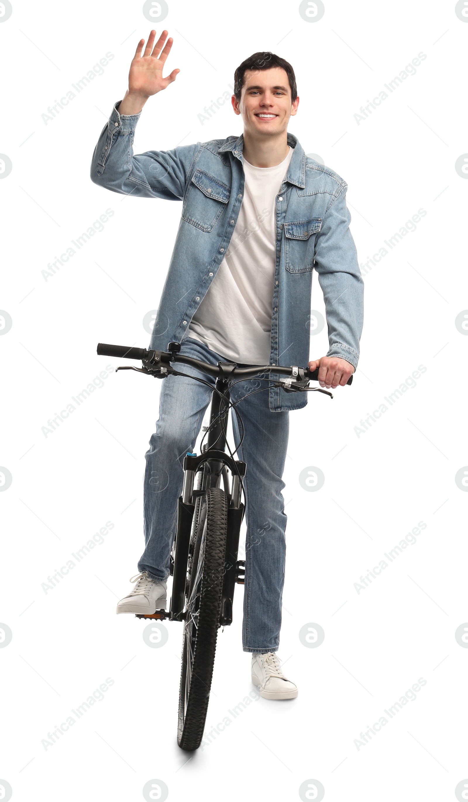 Photo of Smiling man riding bicycle on white background