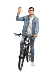 Photo of Smiling man riding bicycle on white background