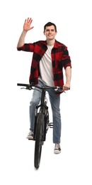 Smiling man on bicycle against white background