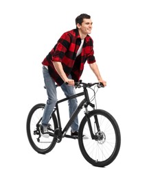 Smiling man riding bicycle on white background