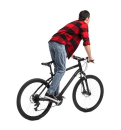 Photo of Young man riding bicycle on white background