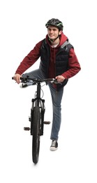 Smiling man in helmet riding bicycle on white background