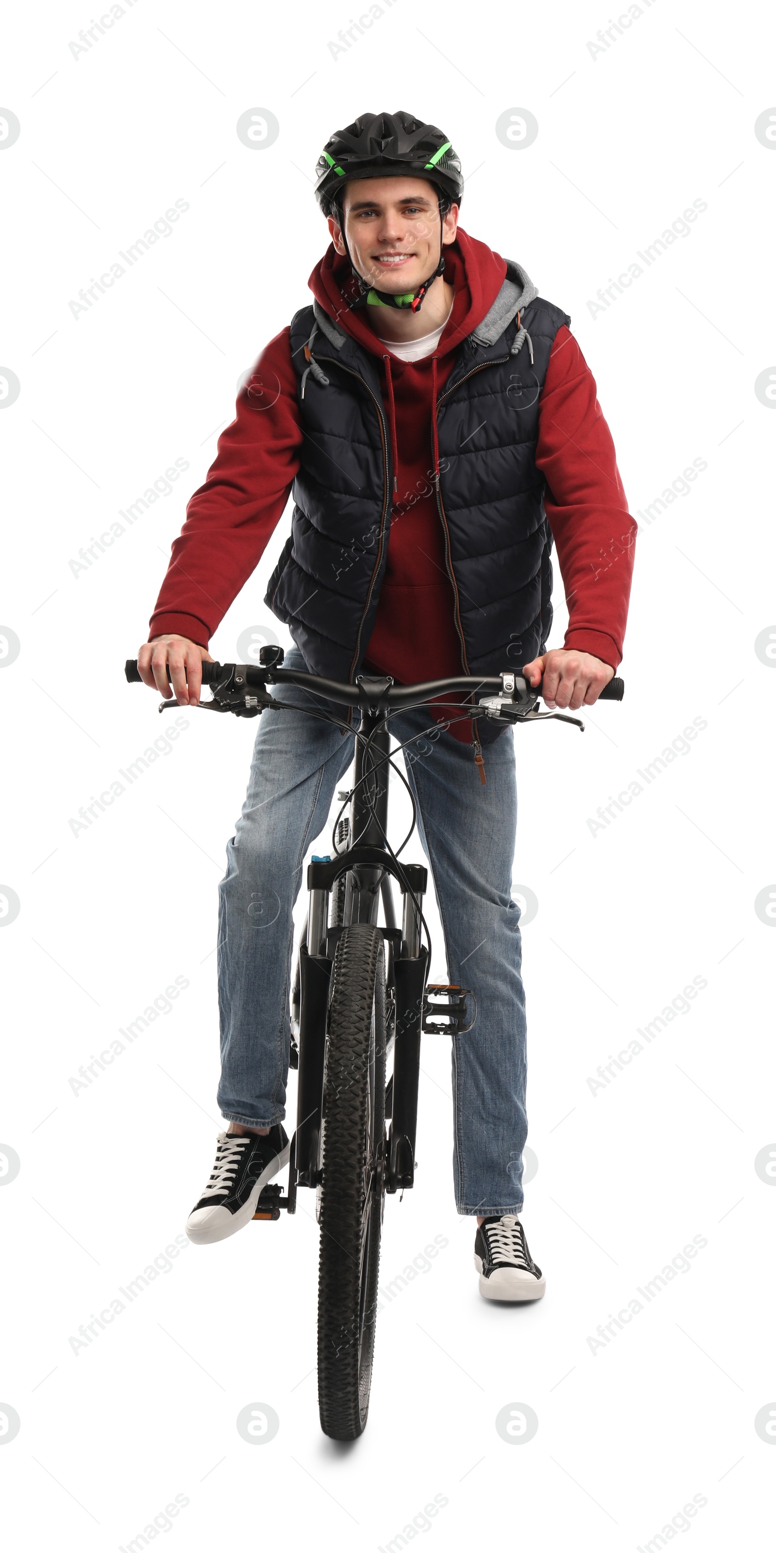 Photo of Smiling man in helmet riding bicycle on white background